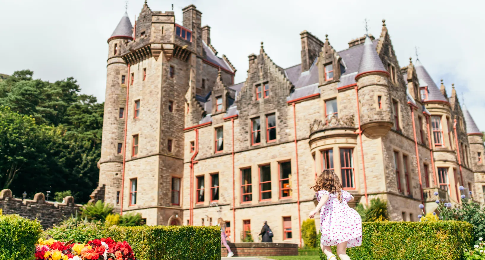 Girl playing in Belfast Castle gardens