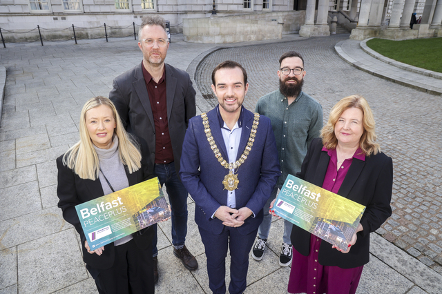 Lord Mayor and representatives of delivery partners from PEACEPLUS projects in front of City Hall