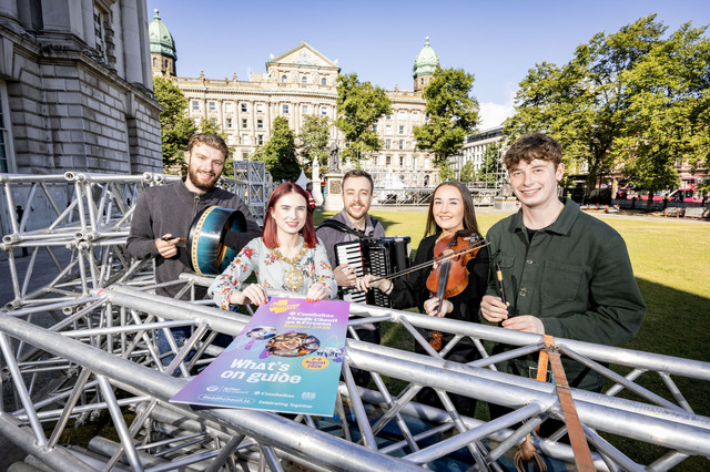 Traditional musicians check out the Gig Rig build with Lord Mayor of Belfast, Councillor Róis-Máire Donnelly 