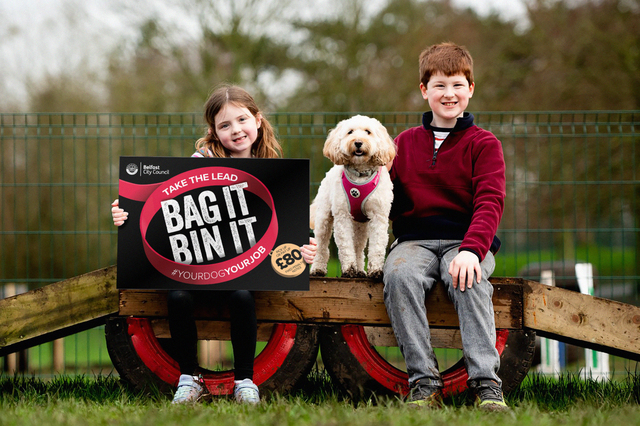Two children and a dog at the new Dog Park at Ormeau