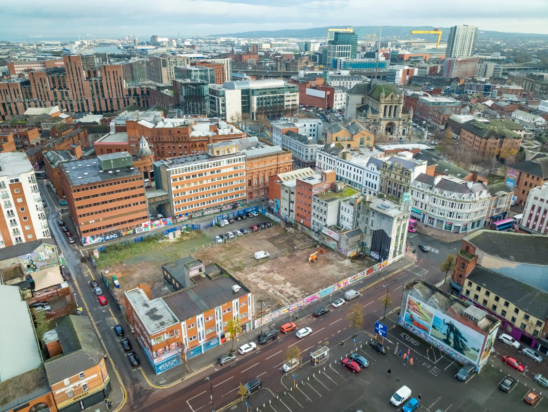 An aerial view of the Belfast Stories site with the heritage building at the corner on the right-hand side.
