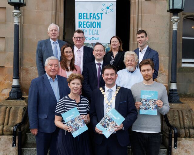 Members of Belfast Region City Deal Council Panel pictured with copies of the Annual Report 2025-26.