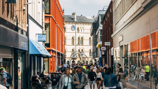 Crowds of people enjoying Belfast city centre