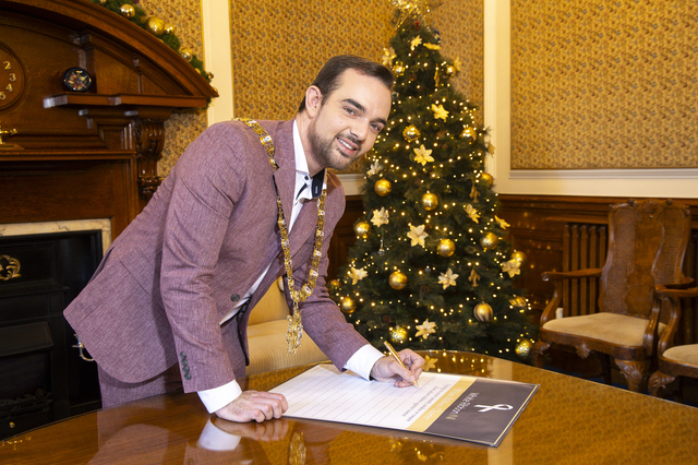 Lord Mayor signing White Ribbon Charter