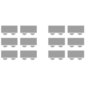 A Classroom style set up with 12 tables fitted with two chairs.