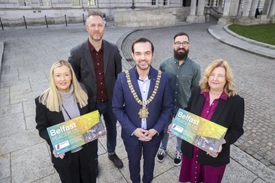 Lord Mayor and representatives of delivery partners from PEACEPLUS projects in front of City Hall