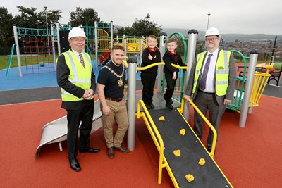 Belfast Lord Mayor Councillor Ryan Murphy with Patrick Anderson from tDfC, Cohan Carson and Cian Carson from Holy Cross Boys’ Primary School and Gareth Johnston from the Executive Office at Marrowbone
