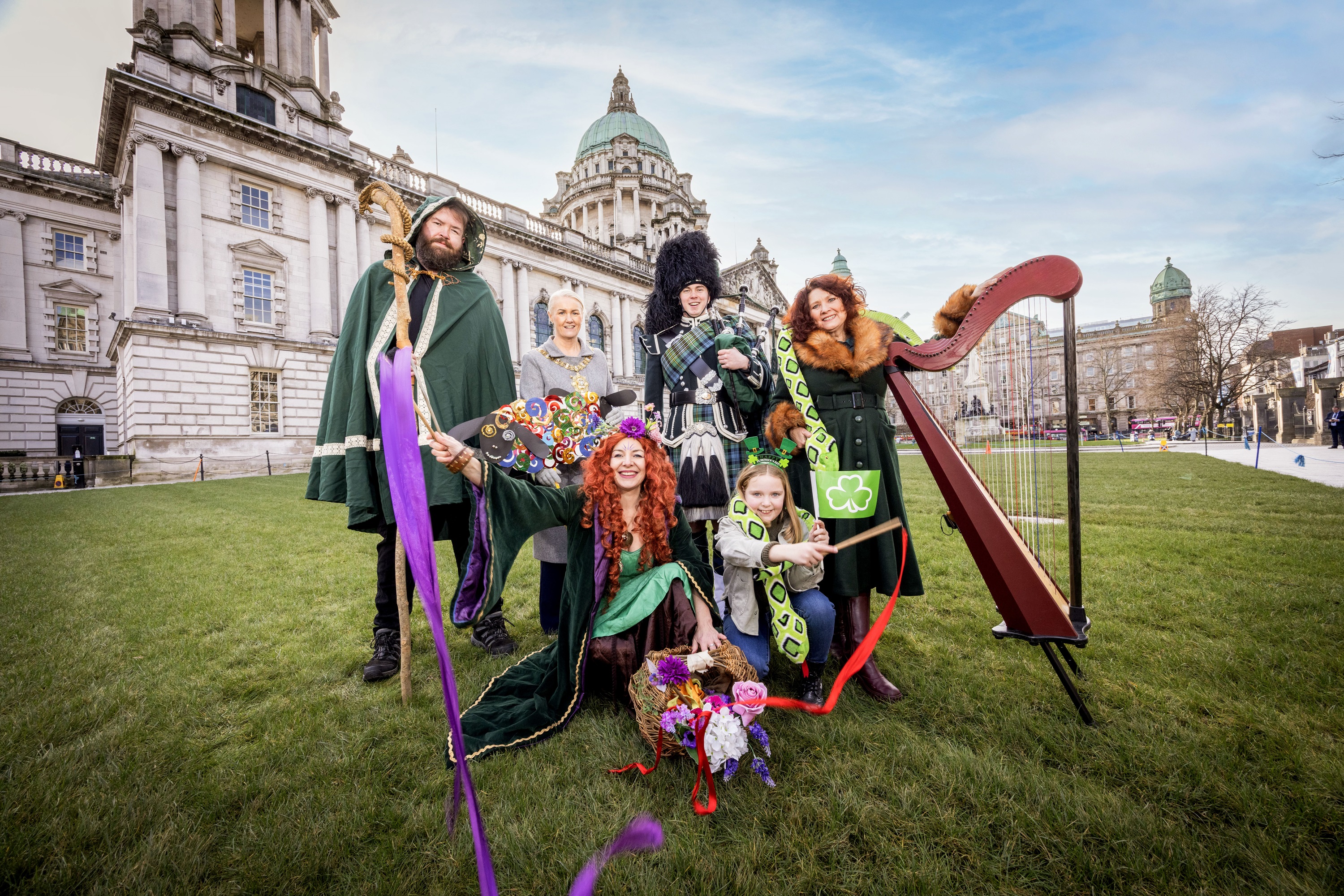 Performers and musicians join the Lord Mayor of Belfast outside City Hall to launch St Patrick's Day programme for Belfast.