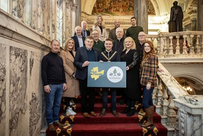 Representatives from Oireachtas na Samhna and Irish language organisations join with the Lord Mayor of Belfast, Councillor Ryan Murphy, to welcome Belfast's successful bid for Oireachtas na Samha.