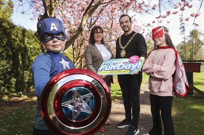 Children dressed as superheroes join the Lord Mayor of Belfast, Councillor Micky Murray and Deirdre Canavan from Depaul to promote upcoming fun day in Lady Dixon Park.