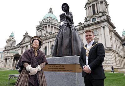 Mary Ann McCracken (Carol Moore from Kabosh Theatre Company) pictured with Lord Mayor Councillor Ryan Murphy following a ceremony to unveil statues of Mary Ann McCracken and Winifred Carney at Belfast