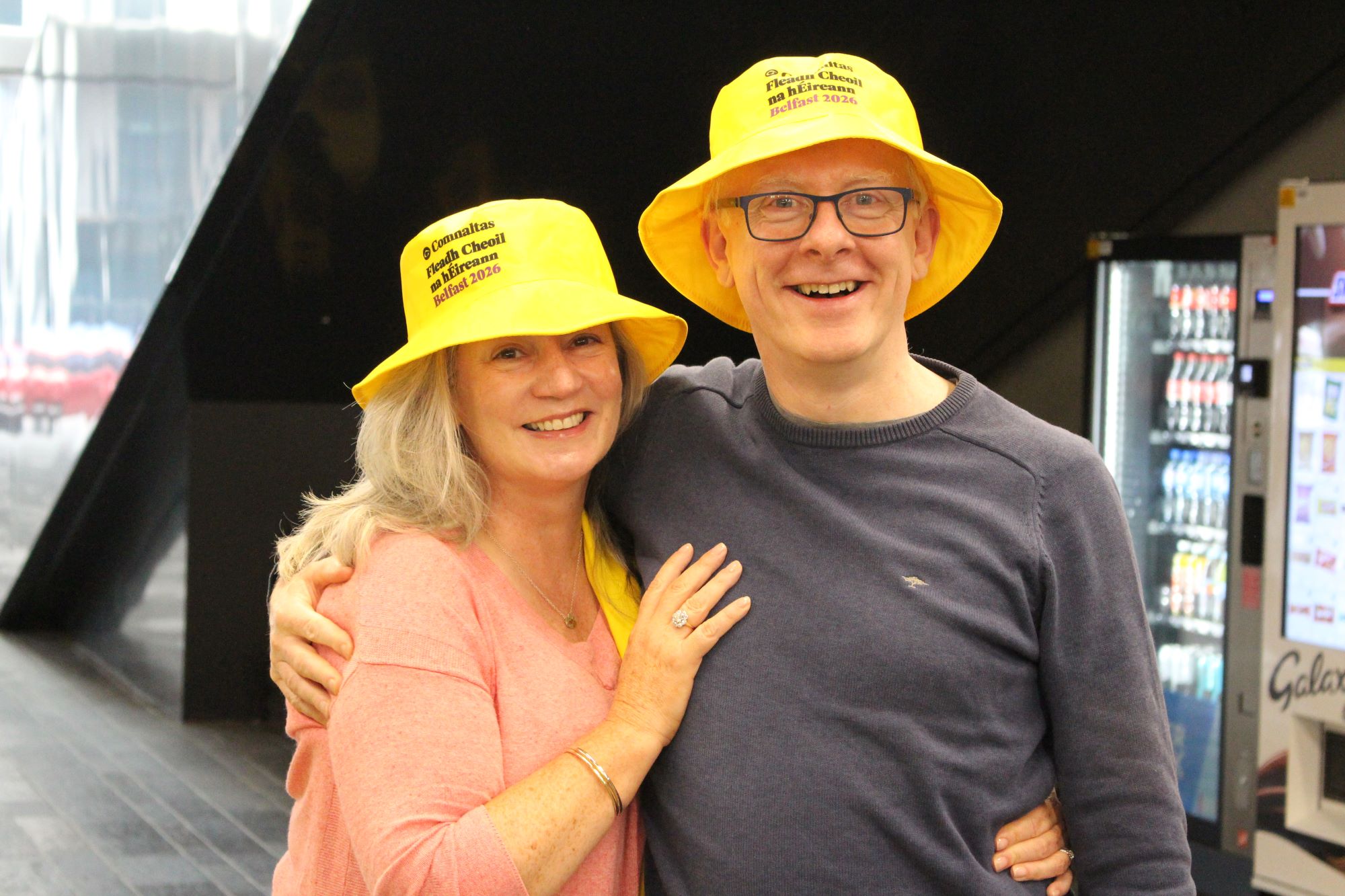 Volunteers for Fleadh Cheoil na hÉireann wearing their yellow hats.