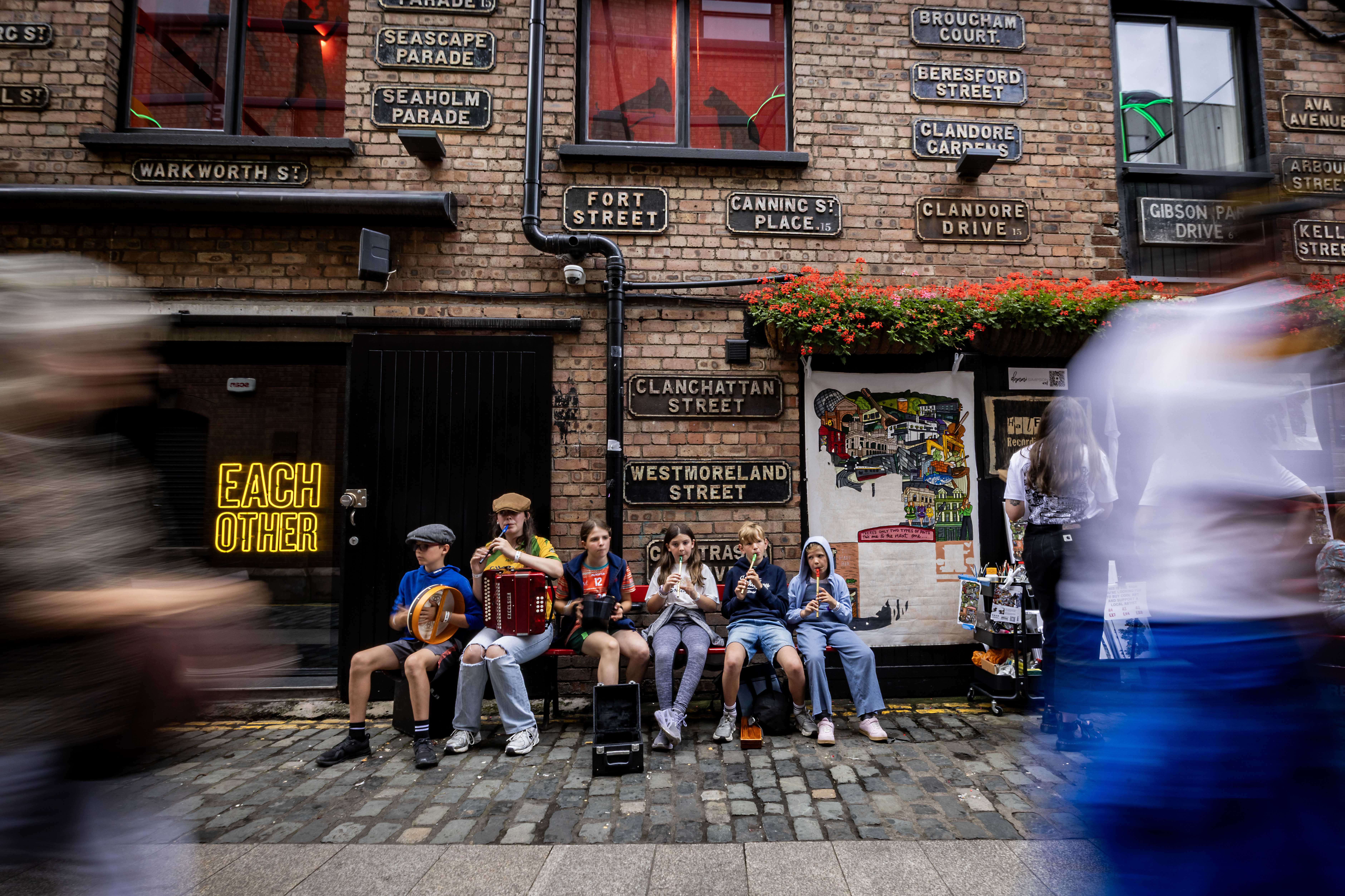 Young musicians play in Belfast's Cathedral Quarter during Fleadh