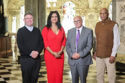 Father Martin Magill, Lata Sharma, Councillor Ian McLaughlin, Deputy Chair of Belfast City Council’s Shared City Partnership, and Bobby Rao, at a event in City Hall for International Day of Peace.