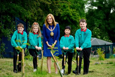 Lord Mayor with P6 pupils from Springhill Primary School who planted trees as part of Belfast's One Million Trees project