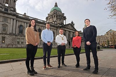 Lord Mayor of Belfast, Councillor Ryan Murphy, pictured with representatives from Conradh na Gaeilge outside City Hall.