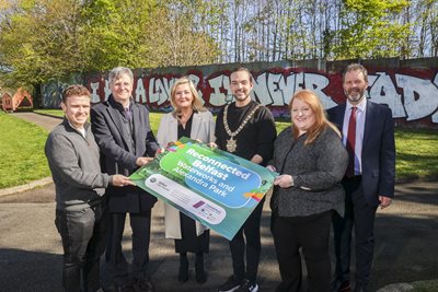 At the PEACEPLUS Reconnected Belfast project launch are Councillor Ryan Murphy, Kieran Moylan, DRCD, SEUPB CEO Gina McIntyre, Lord Mayor Micky Murray, DoJ Minister Naomi Long and John Smith, DfC