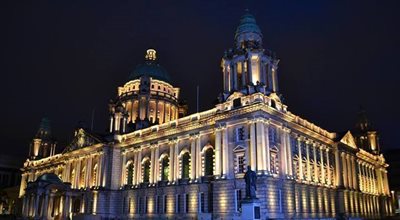 City Hall lit up in yellow.