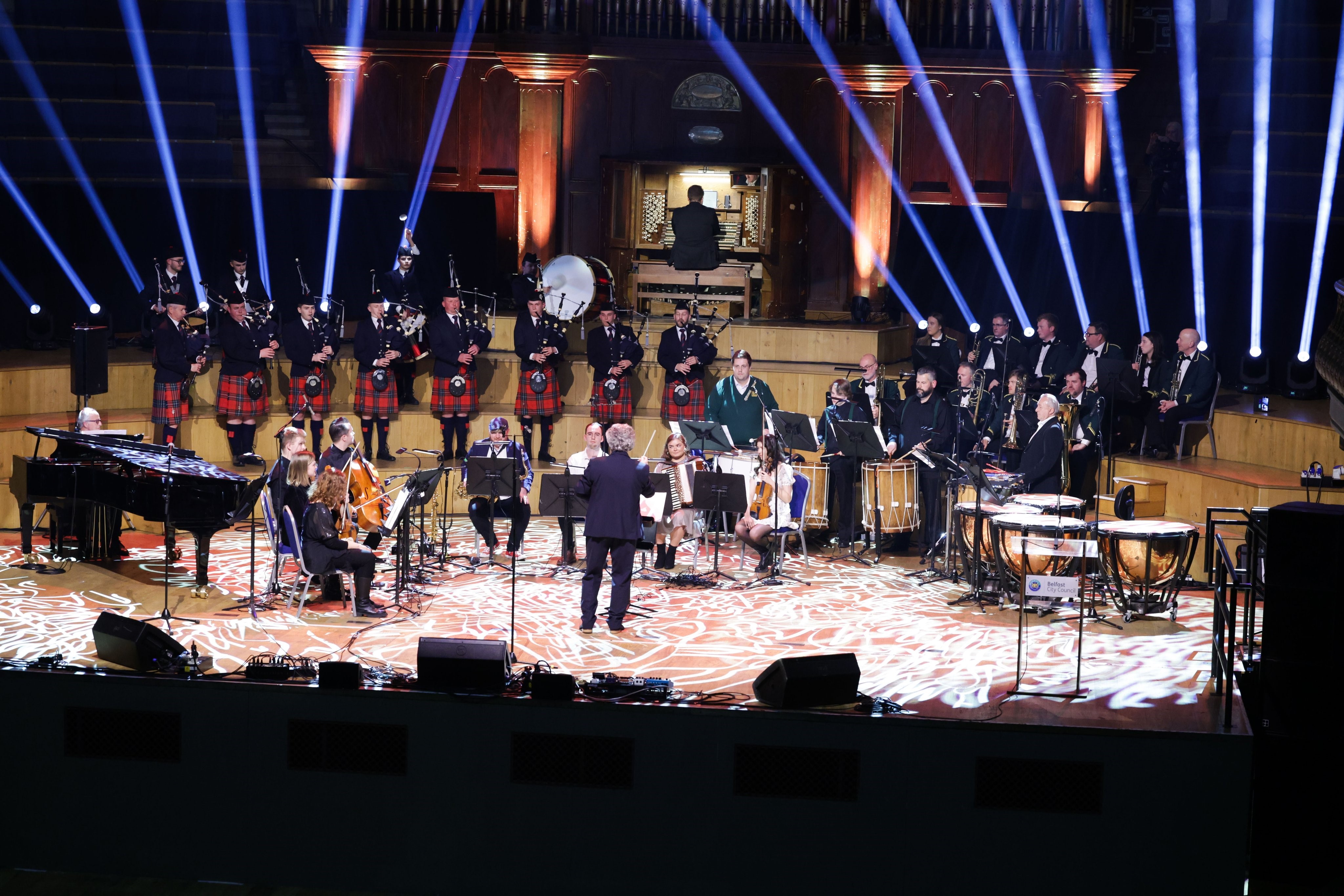 Performers on stage at Ulster Hall.