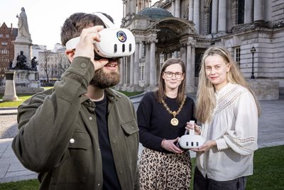 Innovators pictured using VR headsets with High Sheriff outside City Hall