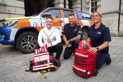 Lord Mayor of Belfast, Councillor Ryan Murphy, pictured with Darren Harper and Kerry Whitehouse from the Community Rescue Service outside City Hall in Belfast 