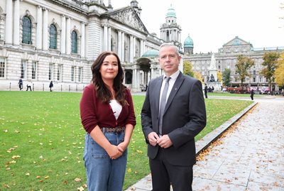 Councillor Natasha Brennan and Pól Deeds from Foras na Gaeilge outside City Hall.