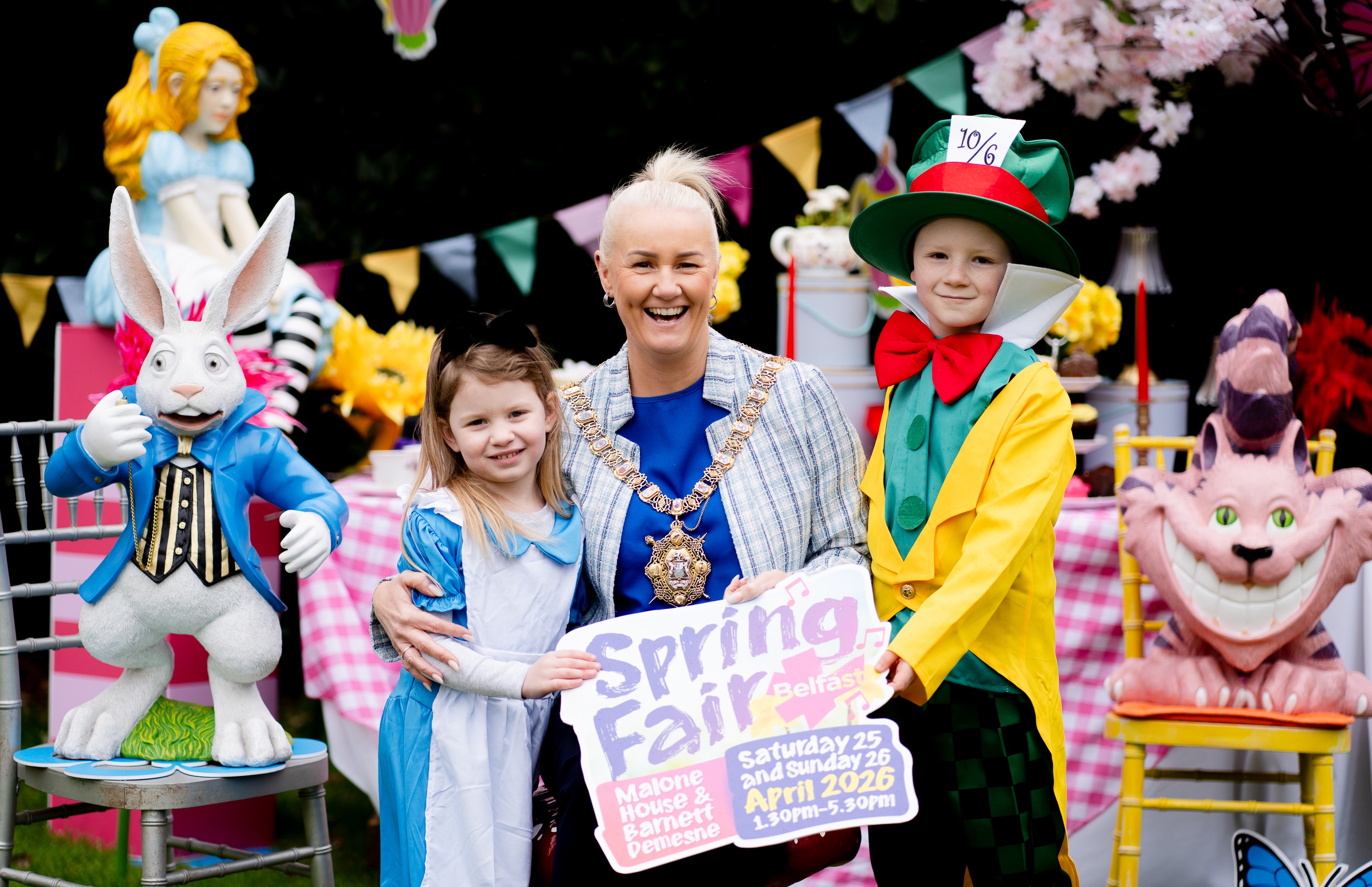 Lord Mayor with children dressed as Alice in Wonderland characters