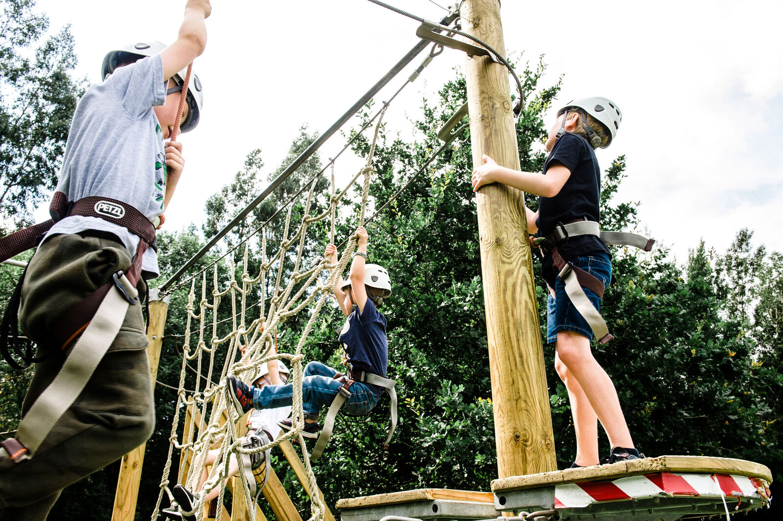 Young people enjoying outdoor climbing