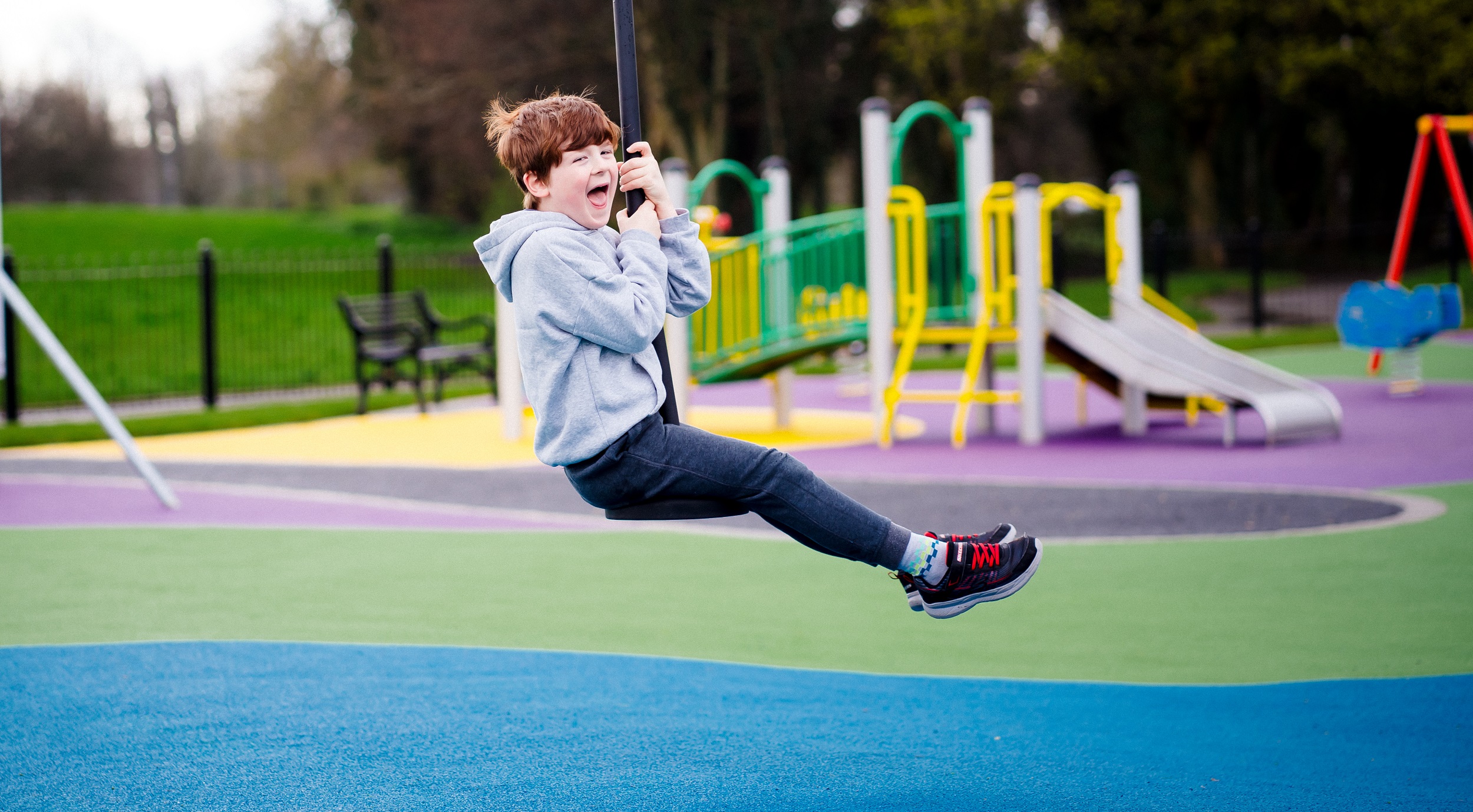 Young boy playing in a playground