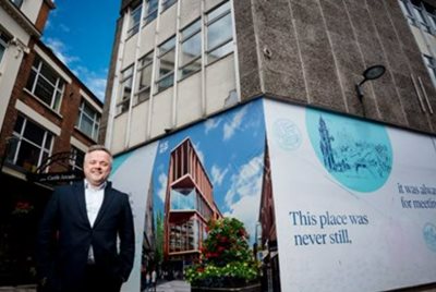 Planning Committee Chair Councillor Carl Whyte alongside the former BHS site.