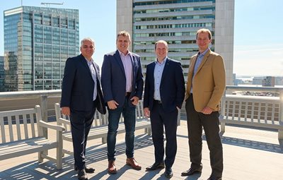 Pictured L-R are Invest NI Interim, CEO Mel Chittock; Globalization Partners (G-P) CEO, Bob Cahill; Economy Minister, Gordon Lyons and Globalization Partners (G-P) Chief Finance Officer, Simone Nardi.