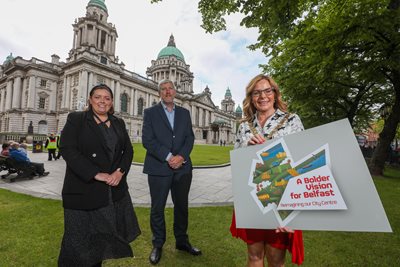 Communities Minister Deirdre Hargey, Infrastructure Minister John O'Dowd and Belfast Lord Mayor Councillor Tina Black standing outside Belfast City Hall.