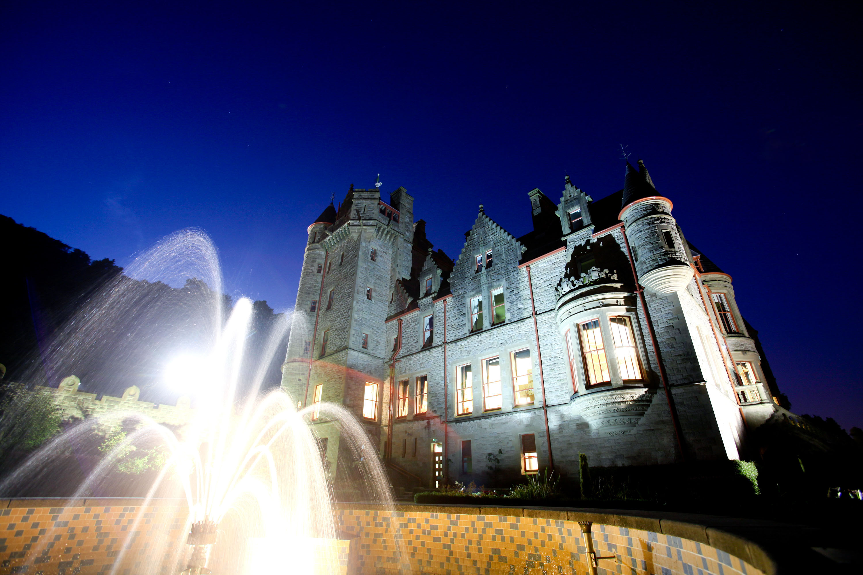 Belfast Castle at night from the fountain in the garden.