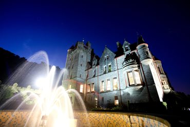 Belfast Castle at night from the fountain in the garden.