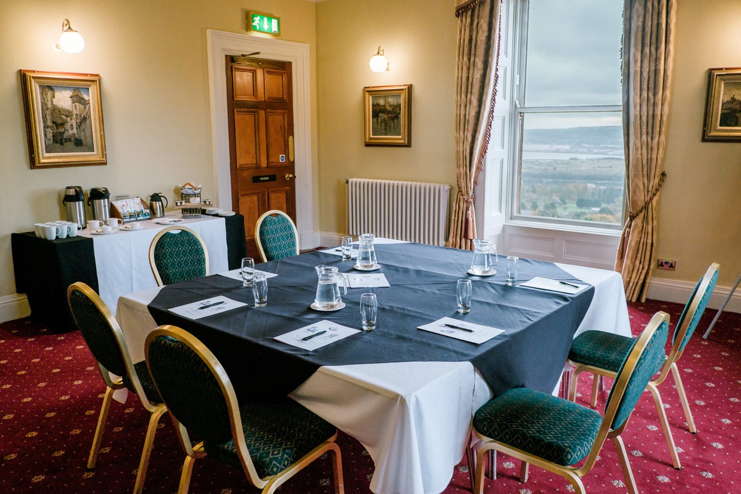 Fisherwick Room with a table and six chairs overlooking Belfast Lough.