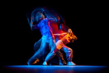 Colourful photo of dancers in studio environment
