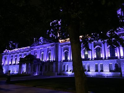 Belfast City Hall illuminated in purple