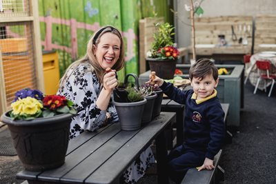 Lord Mayor of Belfast, Councillor Kate Nicholl and Alex Bradley enjoyed some planting today (Thursday 24 March) in the garden of Victoria Nursery School using free compost provided by the Council.