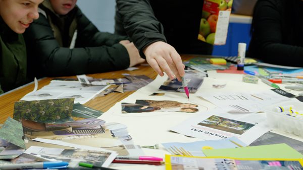A group of children taking part in an art project.