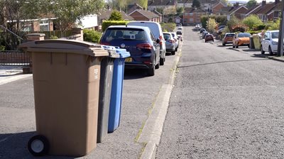 Bins on a Belfast street awaiting collection