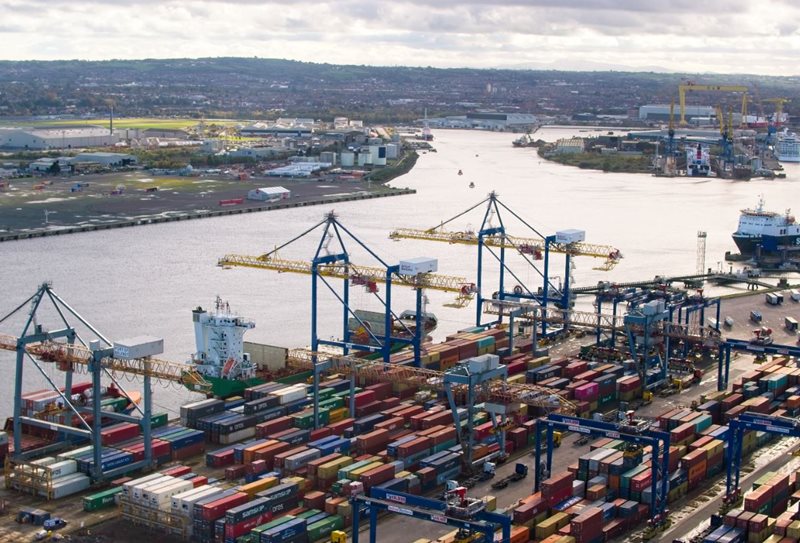 Aerial view of shipping containers and cranes in Belfast Harbour, looking towards Queen’s Island and the River Lagan.