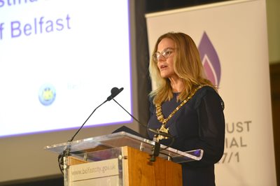 Belfast Lord Mayor Councillor Tina Black speaking from a lectern at Belfast City Hall.
