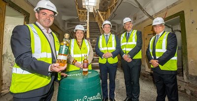 Pictured (L-R) are Belfast Distillery CEO, John Kelly; Communities Minister, Deirdre Hargey; Economy Minister, Gordon Lyons; Infrastructure Minister, John O'Dowd; Invest NI Interim CEO, Mel Chittock.