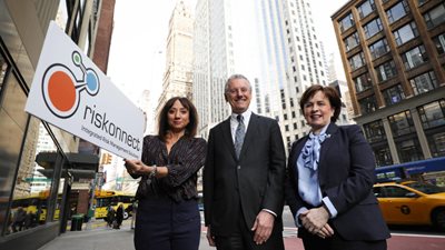 Pictured left-right are: Andrea Brady, Chief Marketing Officer, Riskonnect with Kevin Holland, CEO Invest NI and Economy Minister Diane Dodds.