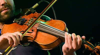 A man plays a violin